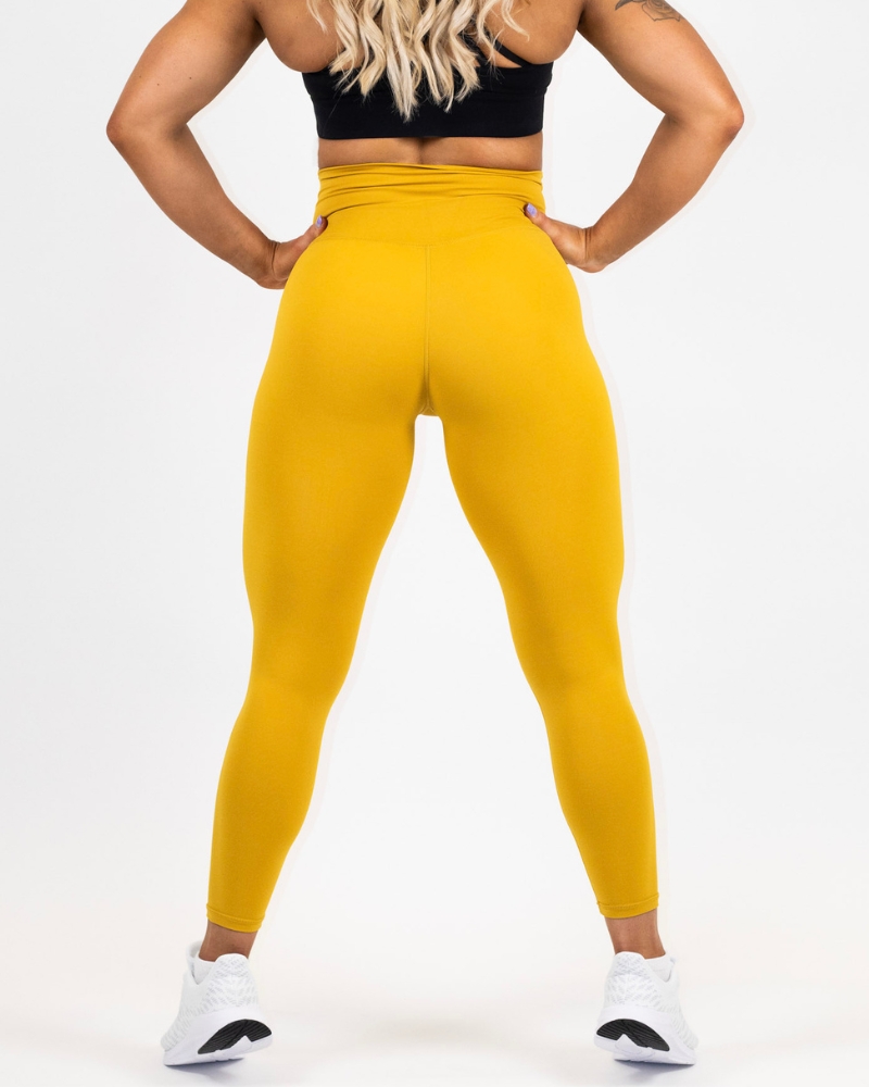Women’s recycled collection training tights, yellow