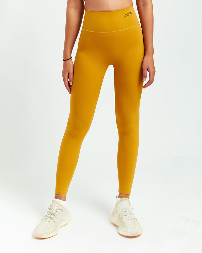 Women's recycled collection training tights, yellow